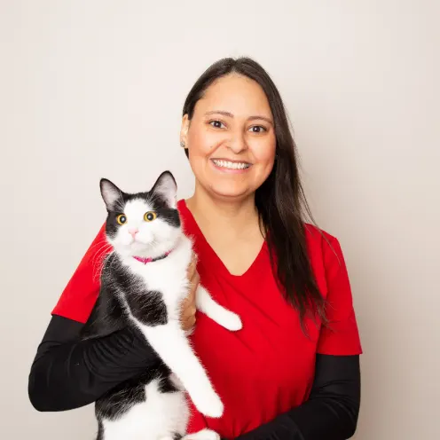 A Kindness Animal Hospital staff member with a cat